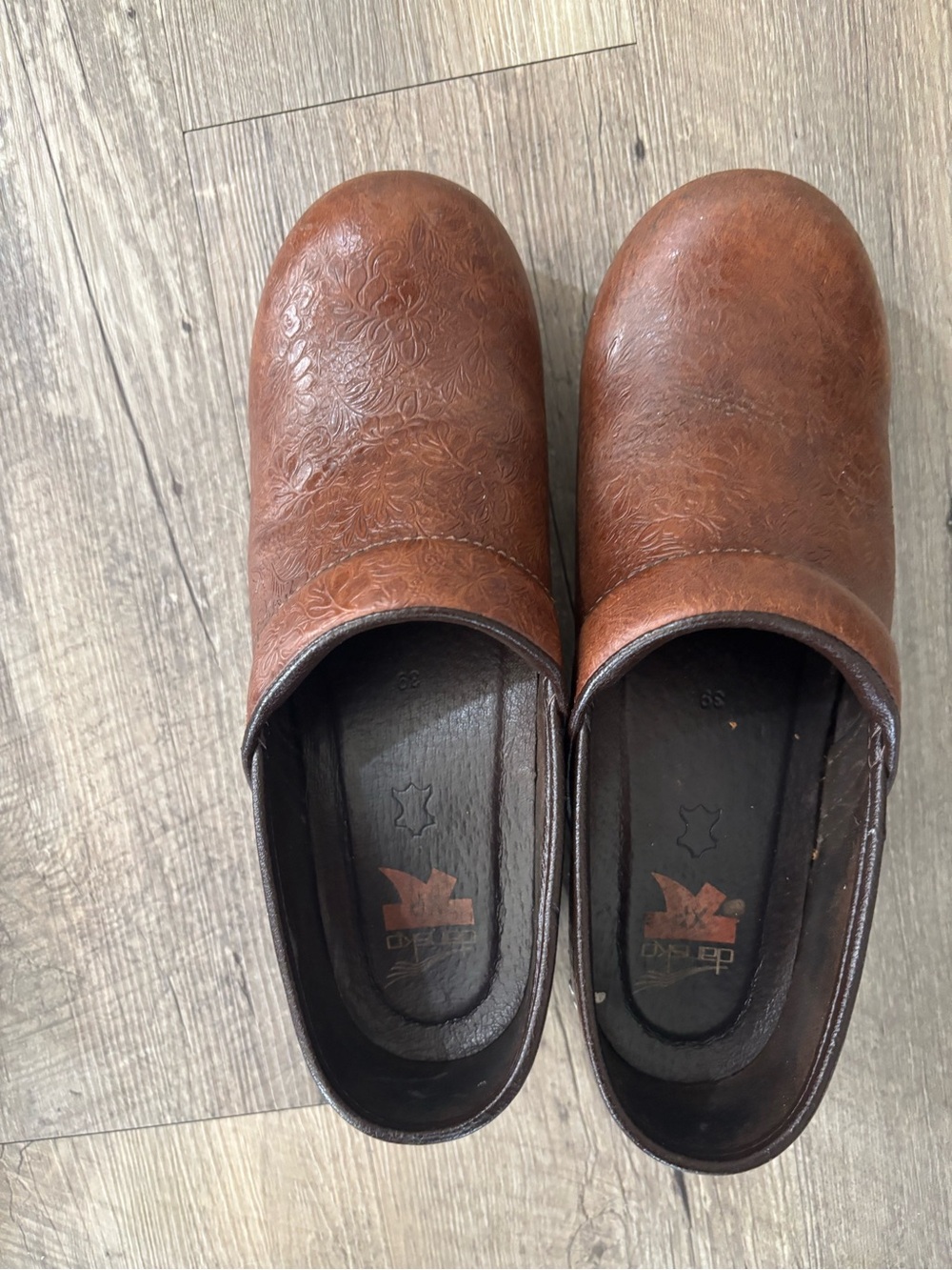 Dansko Brown Leather Clogs with Embossed Detail